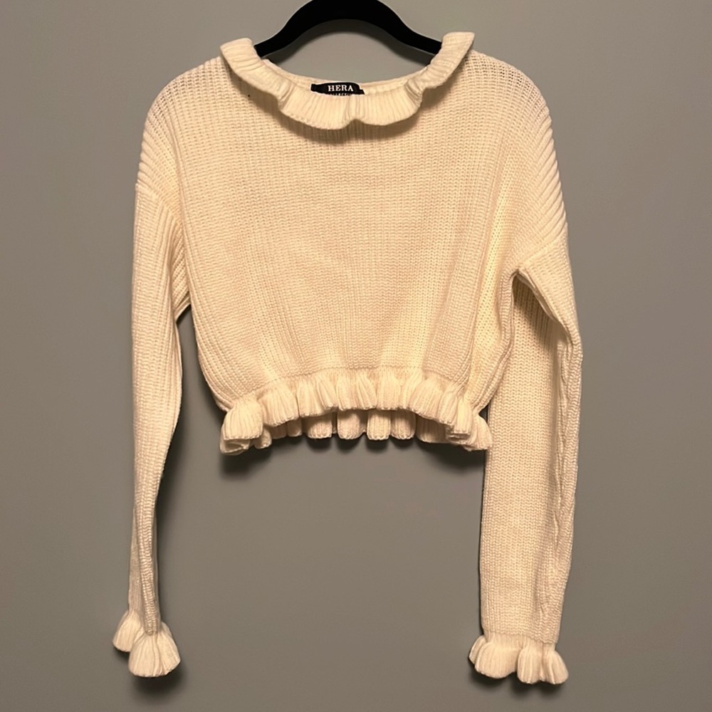 Cropped white knit sweater with frills